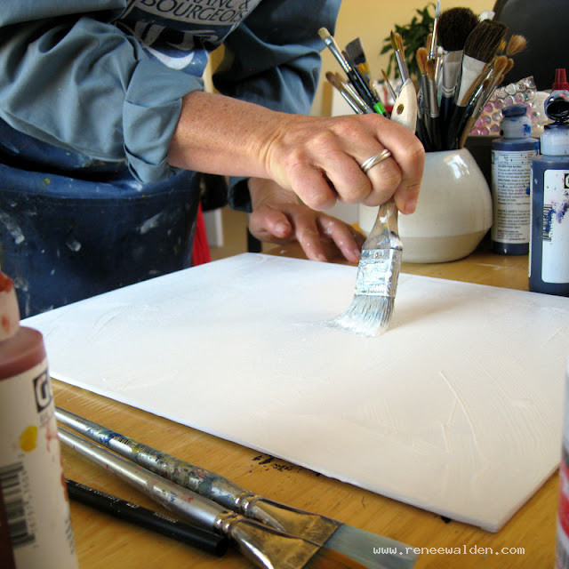 Priming canvas boards