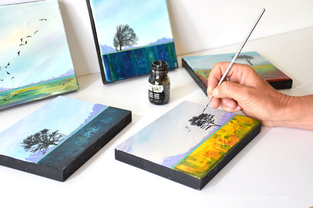 Finishing touches with the tiniest brush imaginable!