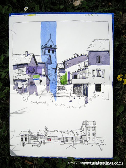Pen and watercolor wash sketch of French village.