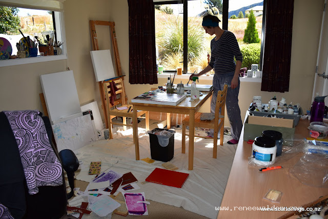 Heidi in the chaos of two people creating in a small space.