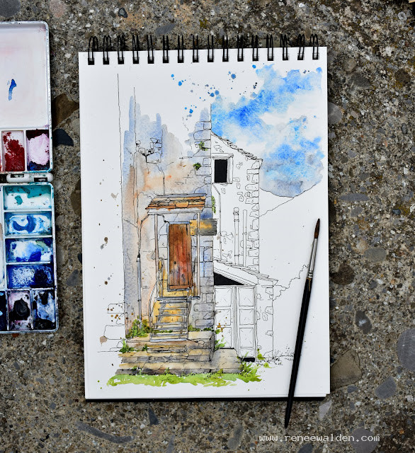 Completing the watercolour washes and adding details with a smaller brush.