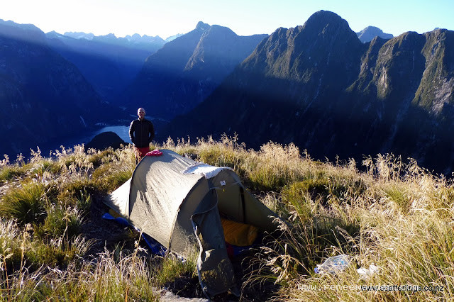 First light catching our tent on Mitre Peak, Milford Sound, Fiordland National Park