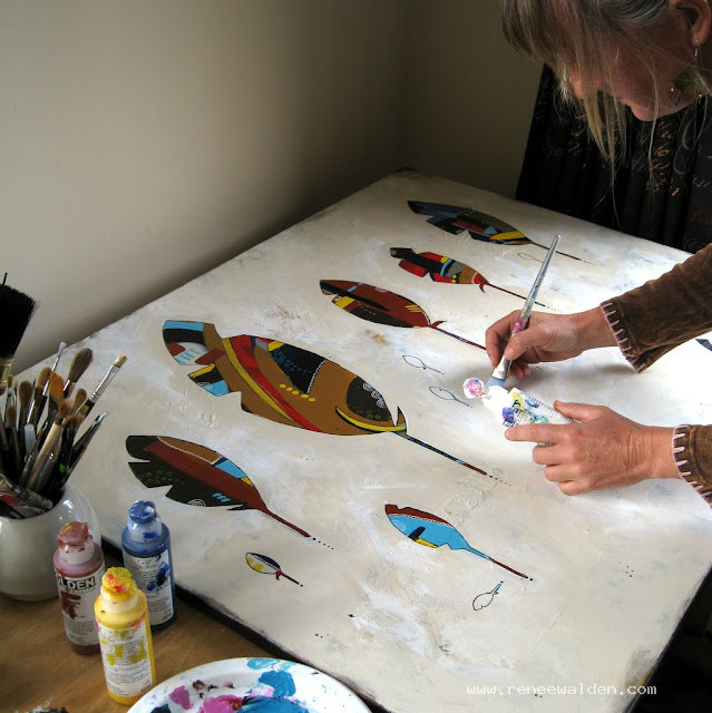 Painting out the background to isolate the feather shapes