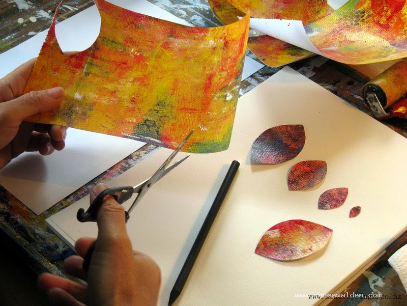 Collaging with hand painted papers
